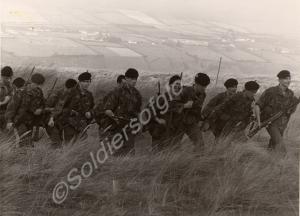 Lieutenant Stephens leads his platoon. "D" Company