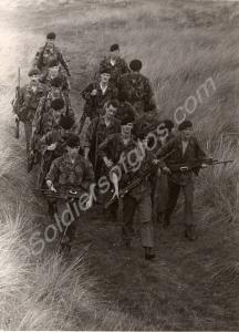 Lieutenant Stephens leads his platoon. "D" Company