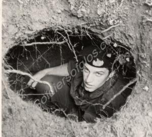 Lieutenant Mark Swan in a two-man hide found by "A