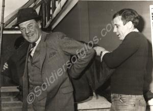 Mr Kershaw M.P. trying on a flak-jacket, Northern