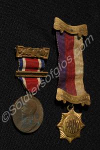 Group of two civilian medals; The King's Medal for