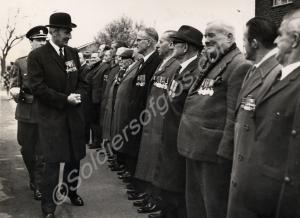 Brigadier Arengo-Jones inspecting veterans of the