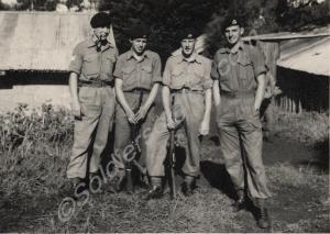 View in camp - 'Pigs out, Glosters in'.   1st Batt