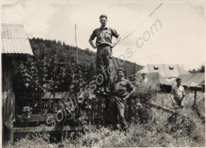 View in camp - 'Pigs out, Glosters in'.   1st Batt