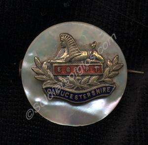 Round enamelled sweetheart brooch with Gloucesters