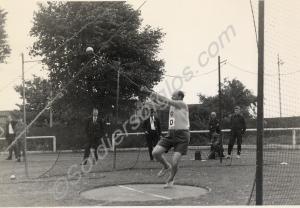 Athletics. Warrant Officer Jizzard swings the hamm