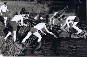 Ferrying a MOBAT anti-tank gun across a river. Glo