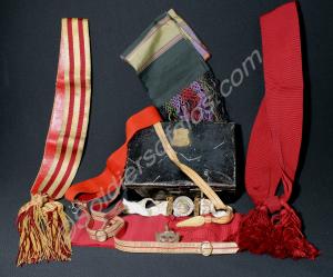 Tin box containing items of officer's dress and eq