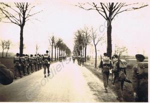 Marching in the rain.  1st Battalion, The Gloucest