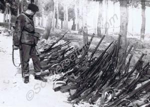 Sergeant Longden of "A" Company with Turkish weapo