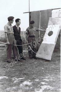 Archery. Sergeant Brisland, Corporal Neville and P