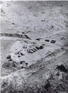 Camp  with Red Cross vehicles. 1st Battalion, The