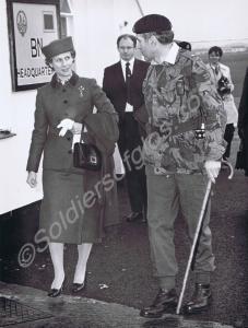 The Duchess of Gloucester accompanied by an office