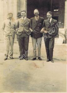 Officers in civilian dress. C.E.A. Firth second fr