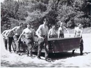 Soldiers carrying pontoons. Gloucestershire Regime
