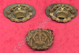Two brass badges of rank,and one worsted denoting