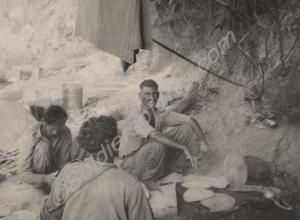 Burmese villagers preparing a meal.  Burma. 1944-1