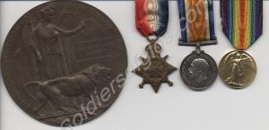 Group of three medals and bronze memorial plaque;