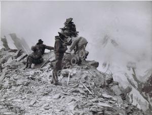 Mountain climbing. At the cairn erected by the Ger