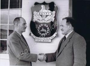 Lieutenant-Colonel C.L.C. Roberts (left) taking ov