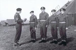 Cadet Sergeant G. Challenger giving a briefing. Gl