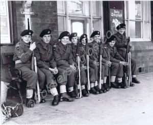 Eight cadets at a railway station. Gloucestershire