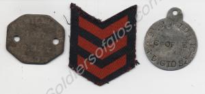 Red foreign service stripes and two identity discs