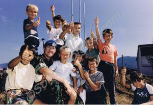 Lance-Corporal  Alan Pock with local children. Roy