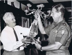 "Mr Stanley Middleton-Foster handing over the miss