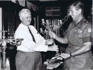 "Major Bill Morris  handing over the replacement