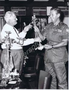 "Major Bill Morris  handing over the replacement