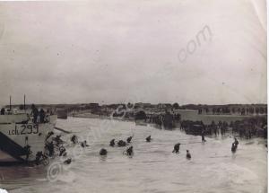 British troops with bicycles wading ashore. Norman