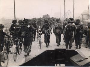 Soldiers going inland after landing on the beaches