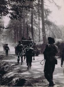 British infantry and armour (Cromwell Mk VII) pass