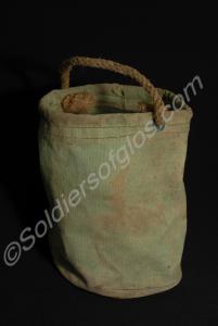 Green canvas water bucket with rope carrying handl