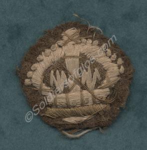 Cushion crown in khaki. Part of Staff Sergeant's b