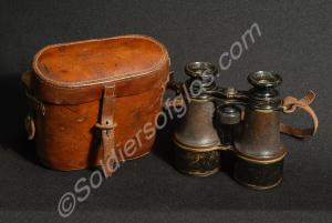 Binoculars and leather case by Heath and Co. Ltd.,