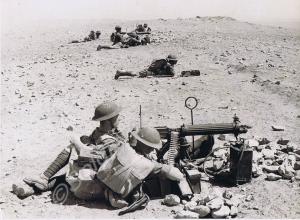 Vickers machine gun crews practise firing. Privat