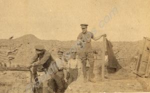 Officers and men working in a trench. "Daily scene