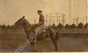 "C.E. Gardner". Lieutenant Gardner on horseback.