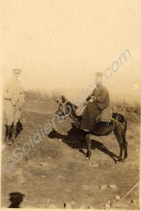 British officer, with Orthodox priest mounted on a