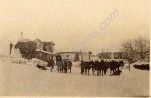 Soldiers with horses in the snow.  2nd Battalion,