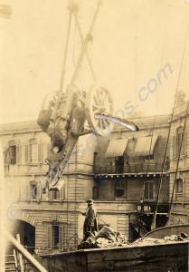 Loading artillery on board ship. Valetta, Malta.