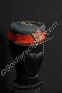 Kepi with dark blue crown with distorted peak, as