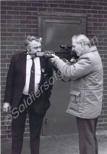 Two veterans with SA80 sniper's rifle. Gloucesters