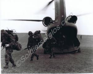 Soldiers of  "B" Company exiting Chinook helicopte