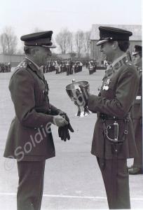 Major Dixon receiving the Hobbs Cup from Brigadier