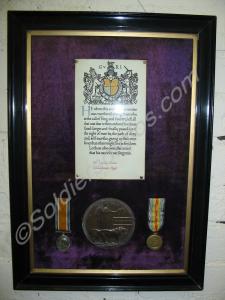 Group of two medals and bronze memorial plaque. Br