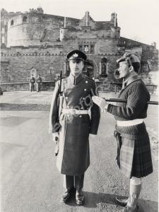 "Pte. Dunn of the Gloucestershire Regiment receivi