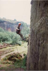 Cadet Darren Waite abseils down the rock face of A